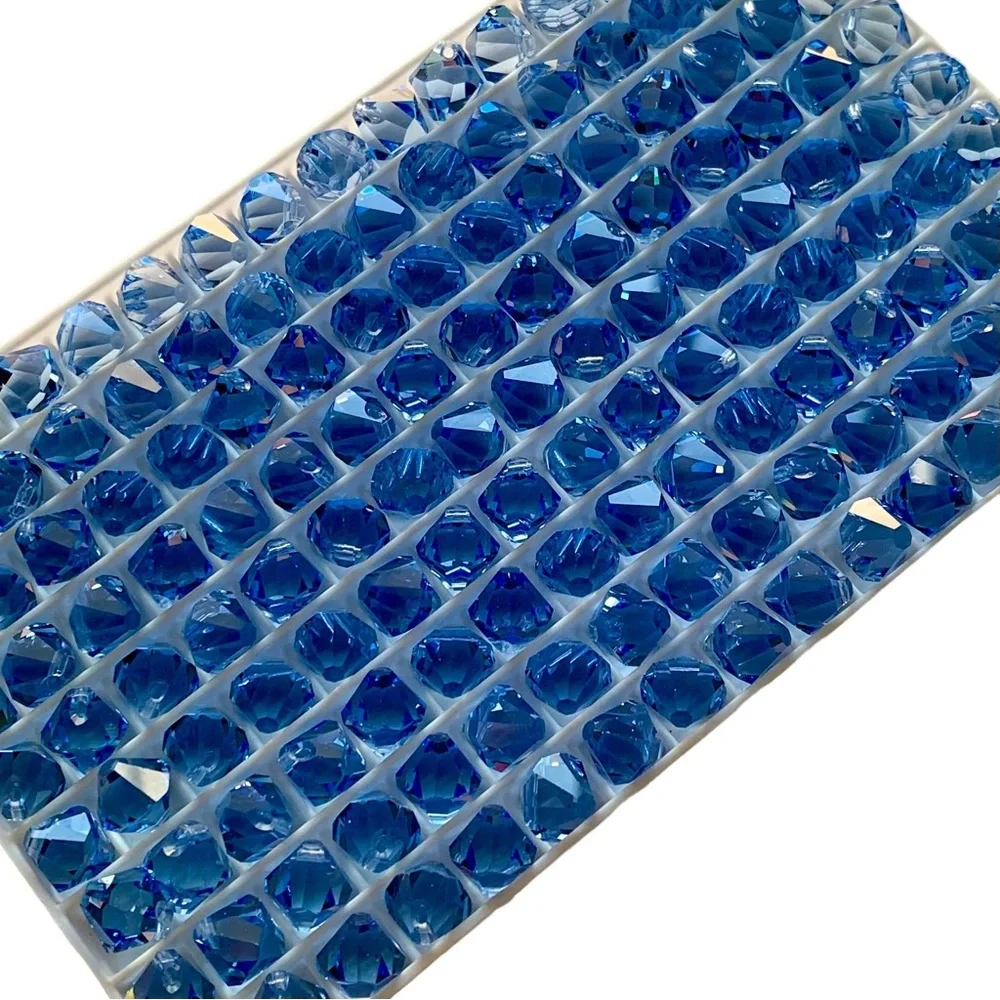 Swarovski Lot/24 8mm Light Sapphire Bicone Faceted Crystals - Made in Au…